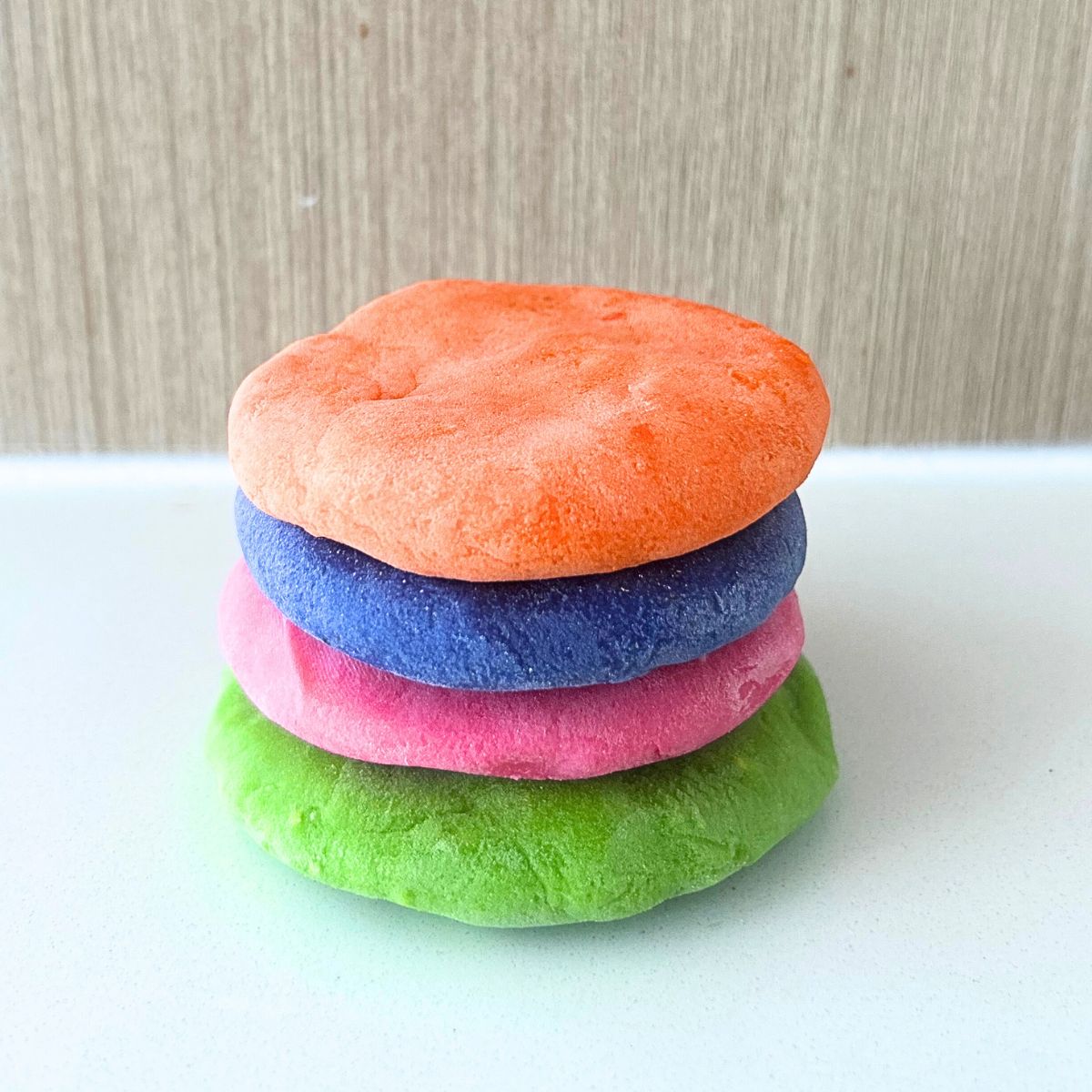 3 stacked colorful circle playdough